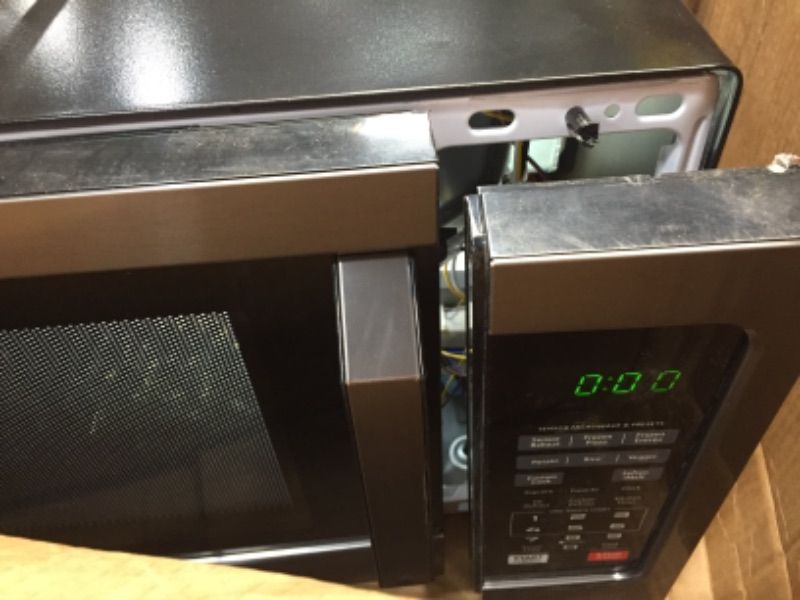 Photo 2 of *** PARTS ONLY DAMAGED***
Toshiba EM131A5C-BS Microwave Oven with Smart Sensor, Easy Clean Interior, ECO Mode and Sound On/Off, 1.2 Cu Ft, Black Stainless Steel
