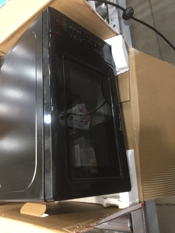 Photo 2 of Magic Chef 0.7 Cu. Ft. Countertop Microwave in Black with Gray Cavity
