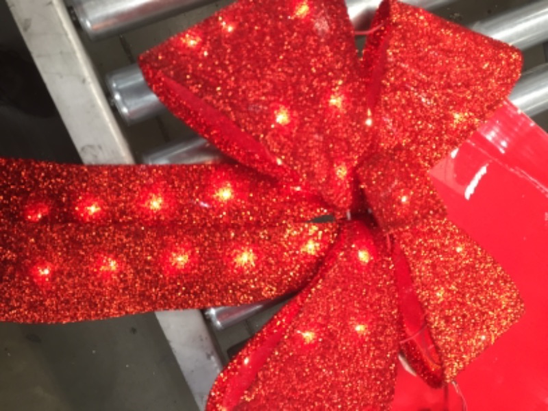 Photo 2 of Home Accents Holiday
24 in Lighted Red Tinsel Bow Yard Sculpture