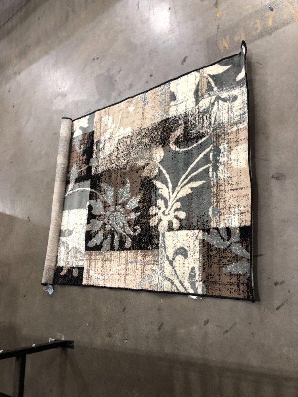 Photo 1 of 4 x 6 area rug , brown , white and black 