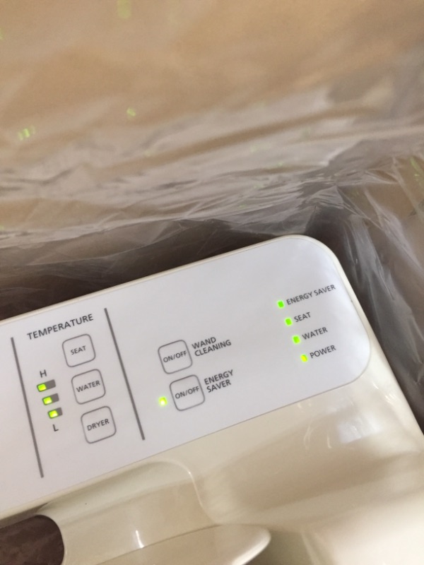 Photo 1 of TOTO SW2034#12 C100 Electronic Bidet Toilet Cleansing Water, Heated Seat, Deodorizer, Warm Air Dryer, and PREMIST, Elongated, Sedona Beige
