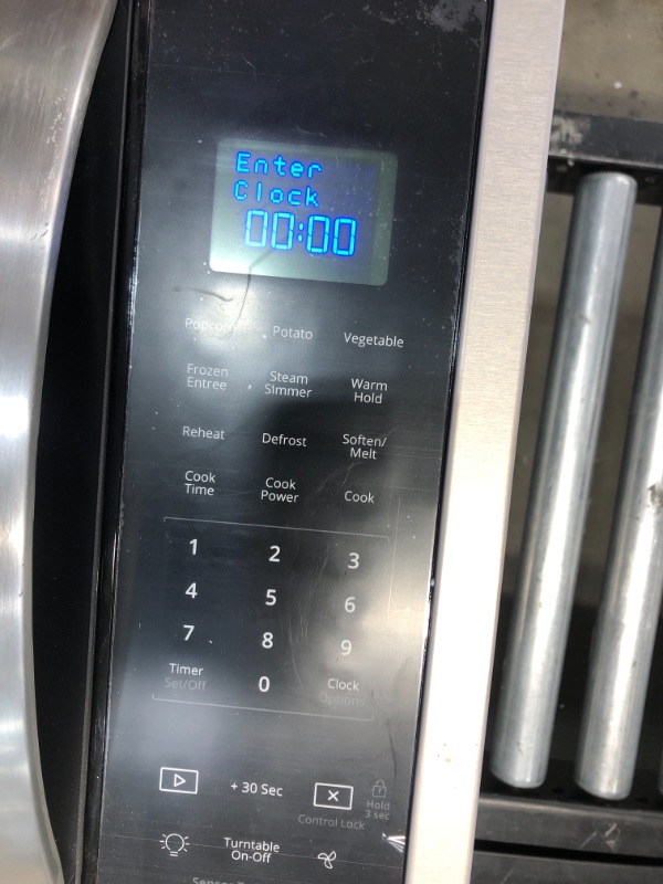 Photo 3 of 1.9 cu. ft. Over the Range Microwave in Fingerprint Resistant Stainless Steel with Sensor Cooking
