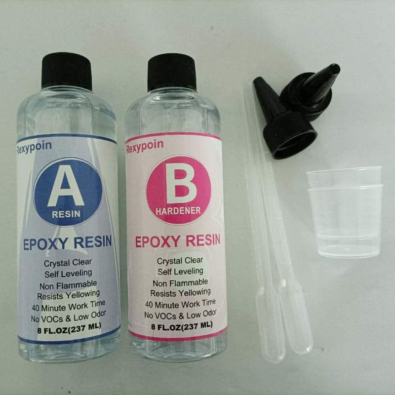 Photo 1 of Rexypoin Epoxy Resin and Hardener Crystal Clear Kit for Jewelry DIY Art Crafts Cast Coating Wood-8 Oz Bonus with 4pcs Graduated Cups, 3pcs Sticks, 1 Pair Rubber Gloves