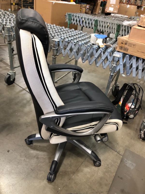 Photo 4 of chair mechanism doesn't work correctly
Serta 44942 Executive Office Chair with Smart Layers Technology | Leather and Mesh Ergonomic with Contoured Lumbar and ComfortCoils | Black & White IN GOOD CONDITION