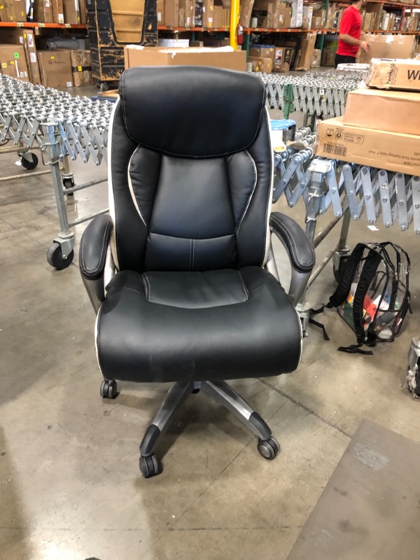 Photo 2 of chair mechanism doesn't work correctly
Serta 44942 Executive Office Chair with Smart Layers Technology | Leather and Mesh Ergonomic with Contoured Lumbar and ComfortCoils | Black & White IN GOOD CONDITION