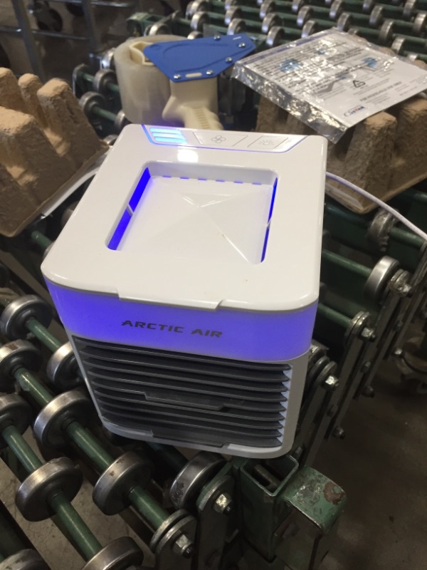 Photo 2 of Ontel Arctic Air Pure Chill Evaporative Ultra Portable Personal Air Cooler with 4-Speed Air Vent, As Seen on TV

//TESTED AND FUNCTIONAL