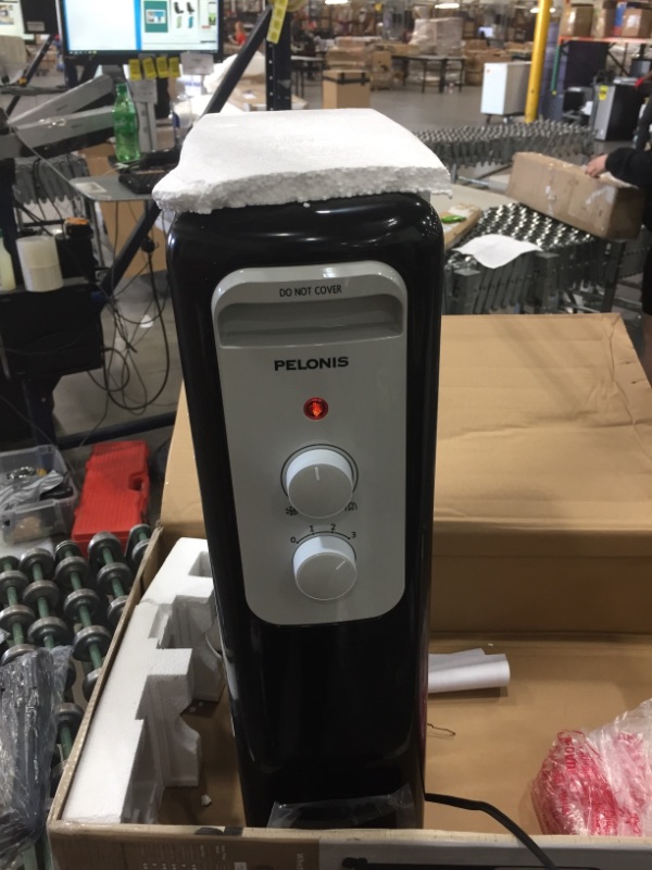 Photo 1 of Pelonis 1,500-Watt Oil-Filled Radiant Electric Space Heater with Thermostat, Black


//TESTED AND FUNCTIONAL