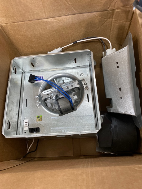 Photo 1 of Broan-NuTone 50 CFM Ceiling Bathroom Exhaust Fan with Light
