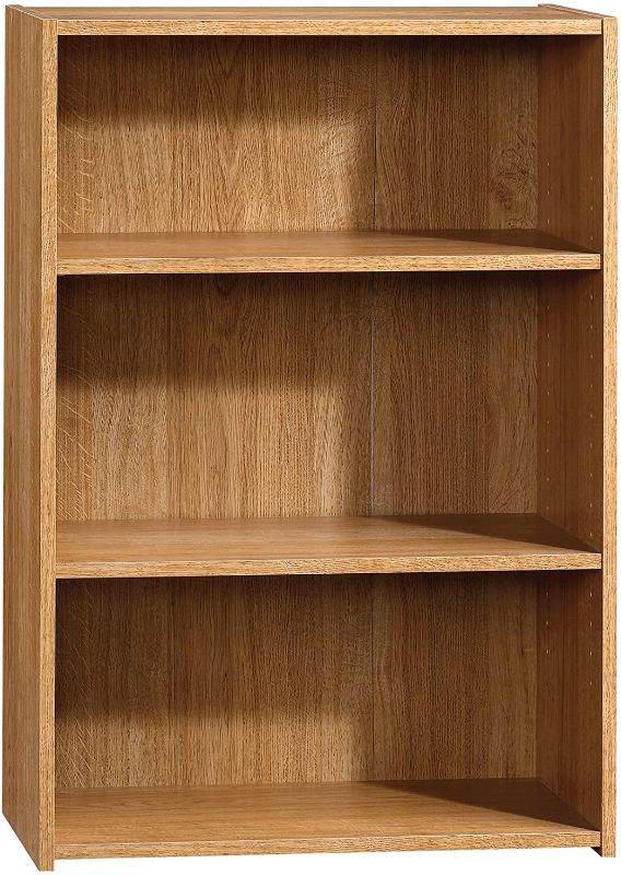 Photo 1 of **ACTUAL COLOR IS BLACK, MISSING HARDWARE, INCOMPLETE**
Sauder Beginnings 3-Shelf Bookcase, Highland Oak finish
