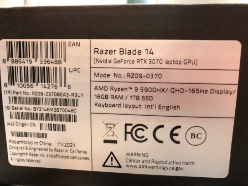 Photo 3 of **ALL SCREWS ATTACHED TO BOTTOM OF LAPTOP ALL. 10 SCREWS INTACT**
Razer Blade 14 14-in QHD 165Hz Gaming Laptop AMD Ryzen 9 5900HX NVIDIA GeForce RTX 3070 16GB RAM 1TB SSD RZ09-0370BEA3-R3U1 Razer 
