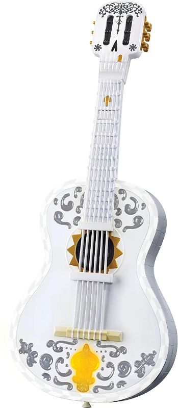 Photo 1 of Disney/Pixar Coco Guitar, Playable Musical Toy with Chord Chart, Approx 25-in (63.5-cm) Long for Kids Ages 3 Years Old & Up [Amazon Exclusive]
