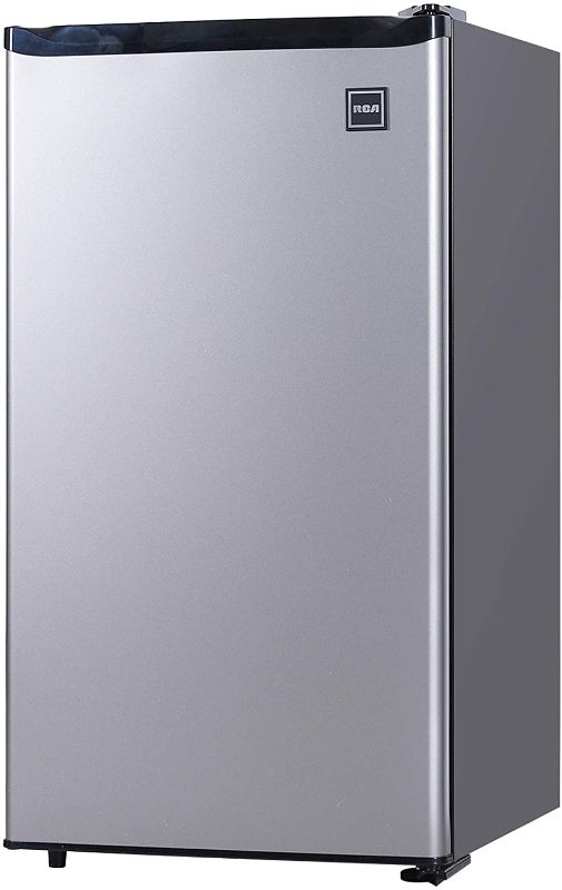 Photo 1 of **BACK RIGHT CORNER ON TOP OF FRIDGE HAS A MINOR DENT**
RCA RFR322-B RFR322 3.2 Cu Ft Single Door Mini Fridge with Freezer, Platinum, Stainless
