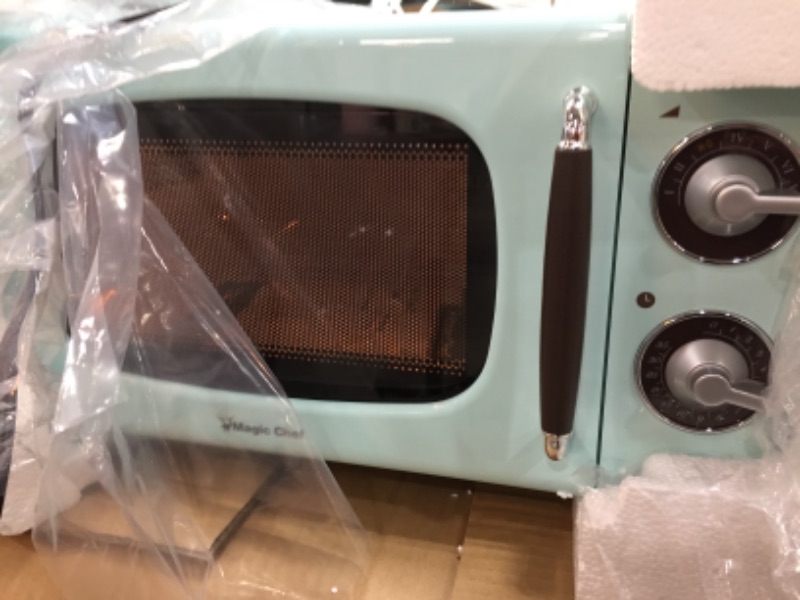 Photo 2 of **MISSING GLASS PLATE**
Magic 0.7 Cu Ft Retro Countertop Microwave 700 Watt Rotary Dial Timer 7 Power Levels - All
