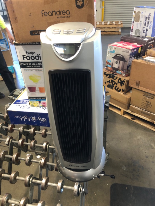Photo 1 of Comfort Zone 1500-Watt Digital Ceramic Oscillating Electric Tower Heater with Fan and Remote

//TESTED AND NONFUNCTIONAL, PARTS ONLY 