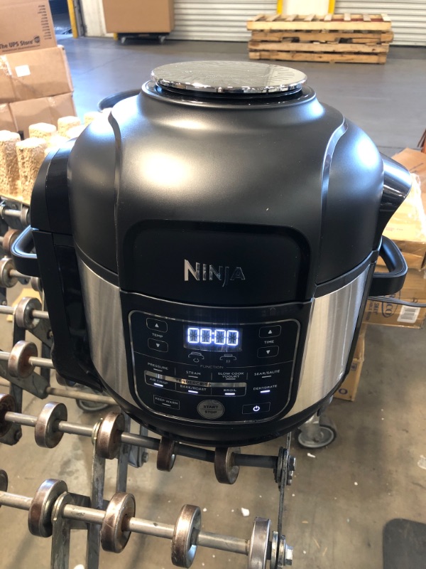 Photo 1 of Ninja OS301 Foodi 10-in-1 Pressure Cooker and Air Fryer with Nesting Broil Rack, 6.5 Quart, Stainless Steel

//TESTED AND FUNCTIONAL
