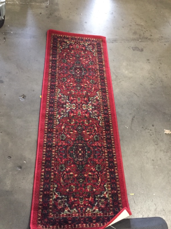 Photo 1 of 58'' x 20'' RED DECOR RUNNING RUG.
SOLD AS IS.