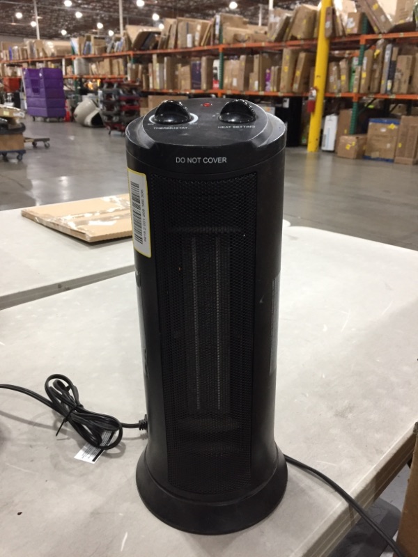 Photo 3 of 1500-Watt Electric Ceramic Tower OSC Space Heater
AS IS USED, COSMETIC DAMAGE, PLEASE SEE PHOTOS 