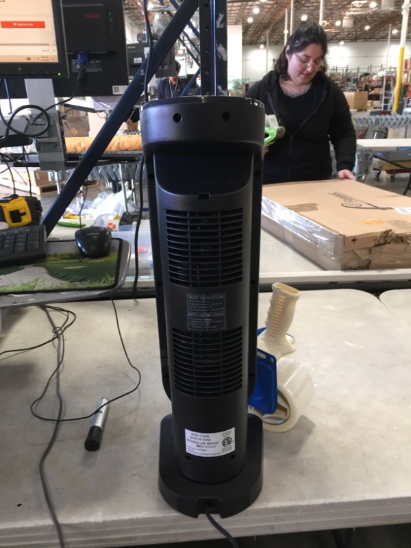 Photo 3 of Tower 22 in. Electric Ceramic Oscillating Space Heater with Digital Display and Remote Control
AS IS USED, MISSING REMOTE, PLEASE SEE PHOTOS 