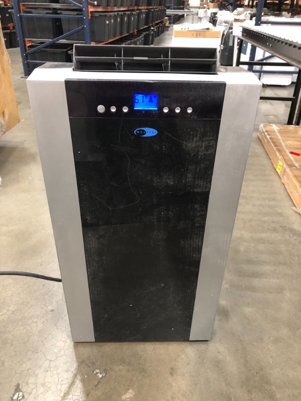 Photo 1 of Whynter Eco Friendly 14000 BTU Dual Hose Portable Air Conditioner
**MISSING SOME ACCESSORIES**BLOWS ICE COLD**HAS SOME MINOR COSMETIC DAMAGE**