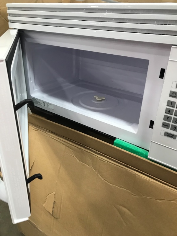 Photo 1 of Black-Decker EM044KJN-P1 1.6 Cu. ft. Over-the-range Microwave with Top Mount Air RECIRCULATION Vent White