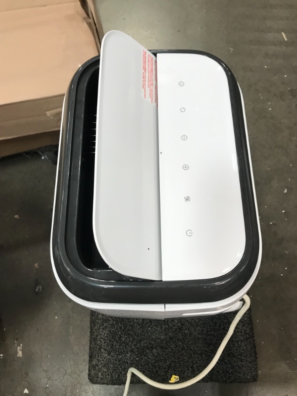 Photo 6 of BLACK+DECKER BPP10HWTB Portable Air Conditioner with Heat and Remote Control, 10,000 BTU SACC/CEC (14,000 BTU ASHRAE), Cools Up to 450 Square Feet, White
**DAMAGED**SELLING FOR PARTS ONLY**DOES NOT BLOW COLD**