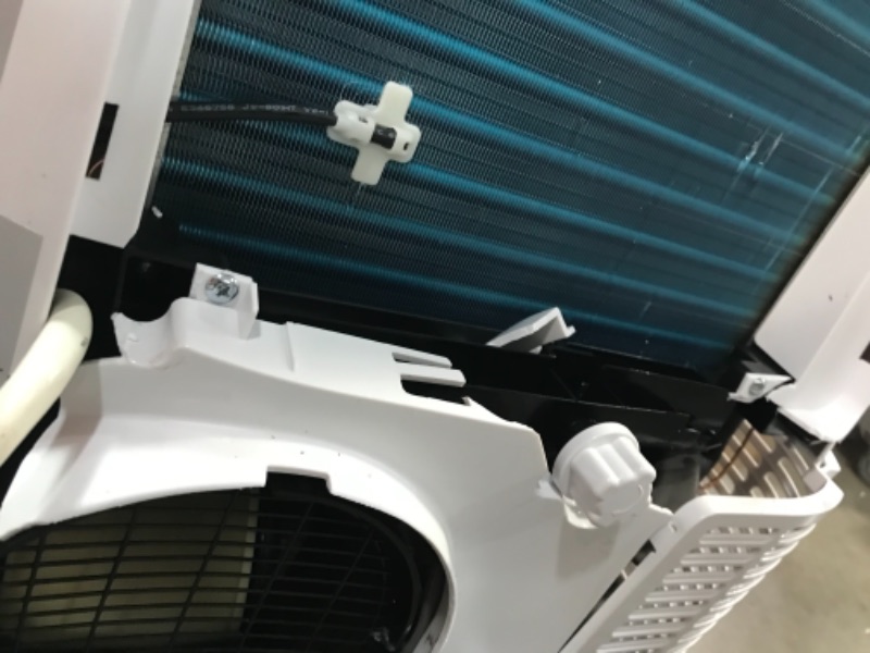 Photo 1 of BLACK+DECKER BPP10HWTB Portable Air Conditioner with Heat and Remote Control, 10,000 BTU SACC/CEC (14,000 BTU ASHRAE), Cools Up to 450 Square Feet, White
**DAMAGED**SELLING FOR PARTS ONLY**DOES NOT BLOW COLD**