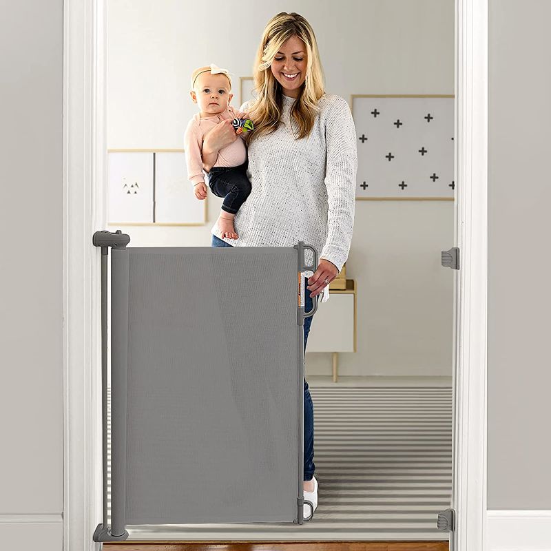 Photo 1 of Momcozy Retractable Baby Gate, 33" Tall, Extends up to 55" Wide, Child Safety Baby Gates for Stairs, Doorways, Hallways, Indoor, Outdoor (Grey, 55"33")
