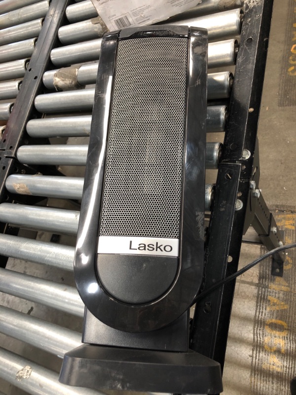 Photo 3 of LASKO Tower 22 in. Electric Ceramic Oscillating Space Heater with Digital Display and Remote 
Control

//MAJOR COSMETIC DAMAGE 