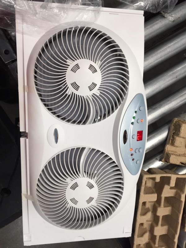 Photo 2 of Bionaire BW2300-N Twin Reversible Airflow Window Fan with Remote Control
