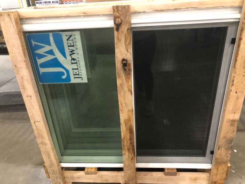 Photo 2 of 41.5 in. x 47.5 in. V-2500 Series White Vinyl Single Hung Window with Fiberglass Mesh Screen
