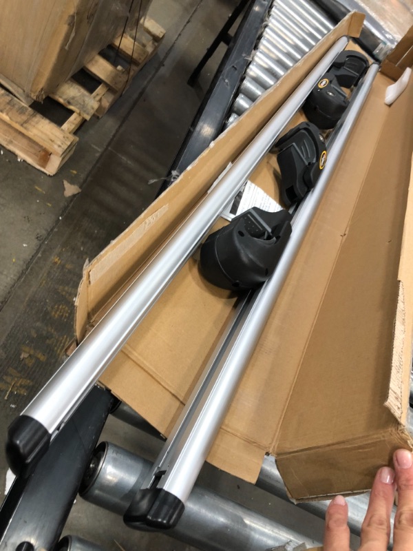 Photo 2 of **PREVIOUSLY USED**
CargoLoc 2-Piece 60" Aluminum Roof Top Cross Bar Set - Fits Maximum 55" Span Across Existing Raised Side Rails with Gap - Features Keyed Locking Mechanism
