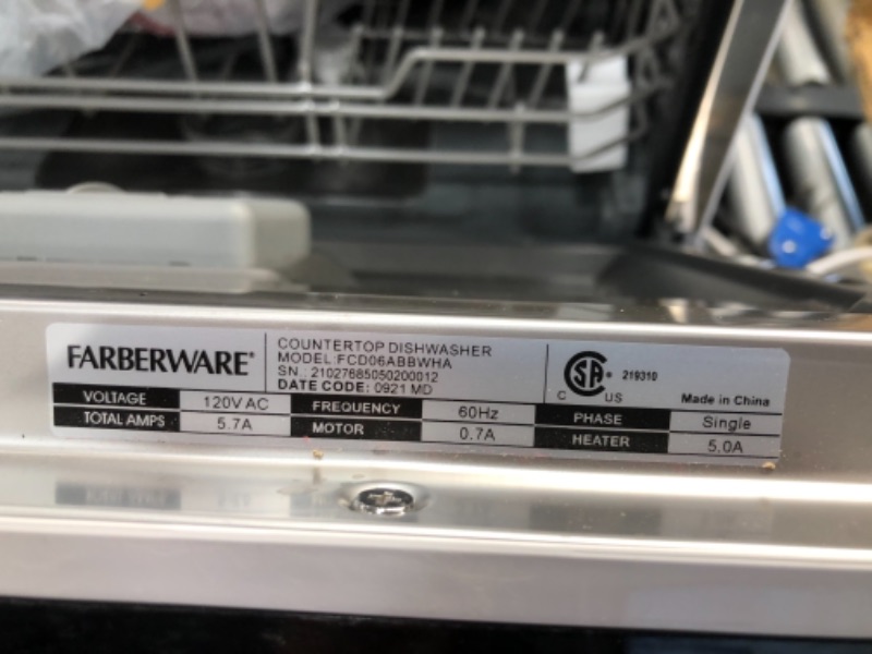Photo 2 of **PREVIOUSLY USED**
Farberware Professional FCD06ABBWHA Compact Portable Countertop Dishwasher with 6 Place Settings and Silverware Basket, LED Display, Energy Star, White
