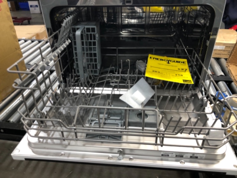 Photo 7 of **PREVIOUSLY USED**
Farberware Professional FCD06ABBWHA Compact Portable Countertop Dishwasher with 6 Place Settings and Silverware Basket, LED Display, Energy Star, White
