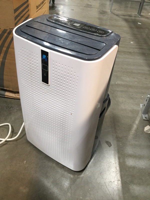 Photo 2 of *selling for PARTS, NO RETURNS*
JHS A018-12KR/A 12,000 BTU Portable Air Conditioner 3-in-1 Floor AC Unit with 3 Fan Speeds, Remote Control and Digital LED Display, Cover up to 400 Sq. Ft, White, 14.2" D x 16.6" W x 28.5" H
