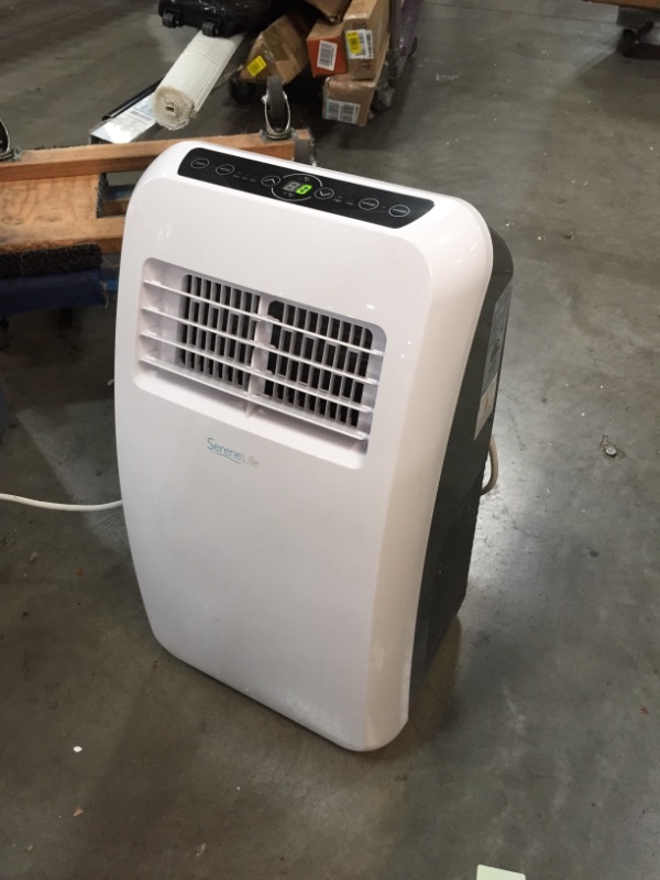 Photo 2 of *USED*
*SEE last picture for damage*
Portable Electric Air Conditioner Unit - 900W 8000 BTU Power Plug In AC Cold Indoor Room Conditioning System w/ Cooler, Dehumidifier, Fan, Exhaust Hose, Window Seal, Wheels, Remote - SereneLife SLPAC8
