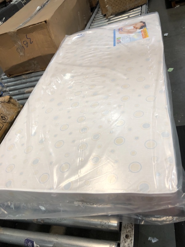 Photo 2 of Delta Children Twinkle Stars Fiber Core Crib and Toddler Mattress | Waterproof | Lightweight | GREENGUARD Gold Certified (Natural/Non-Toxic), 5in H x 27.5in W x 52in L