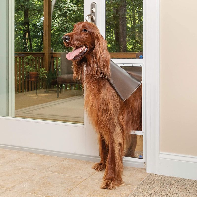 Photo 1 of *SEE last picture for damage*
*MISSING manual and foam strip*
Petsafe Freedom Patio Panel Pet Door - Large Tall 91 7/16" - 96"- White