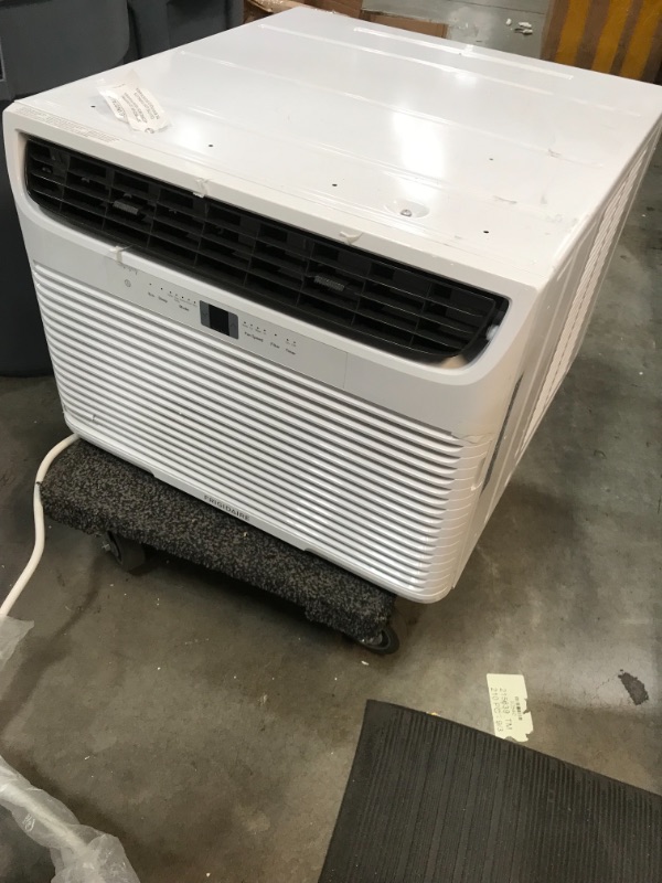 Photo 2 of *unable to test due to plug*
*SEE last picture for damage*
Frigidaire 18,500 BTU Window-Mounted Room Air Conditioner in White with Heat and Remote