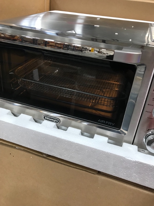 Photo 4 of *USED*
*MISSING pizza tray*
De'Longhi Livenza 9-in-1 Digital Air Fry Convection Toaster Oven, Grills, Broils, Bakes, Roasts, Keep Warm, Reheats, 1800-Watts + Cooking Accessories, Stainless Steel, 14L (.5 cu ft), EO141164M
