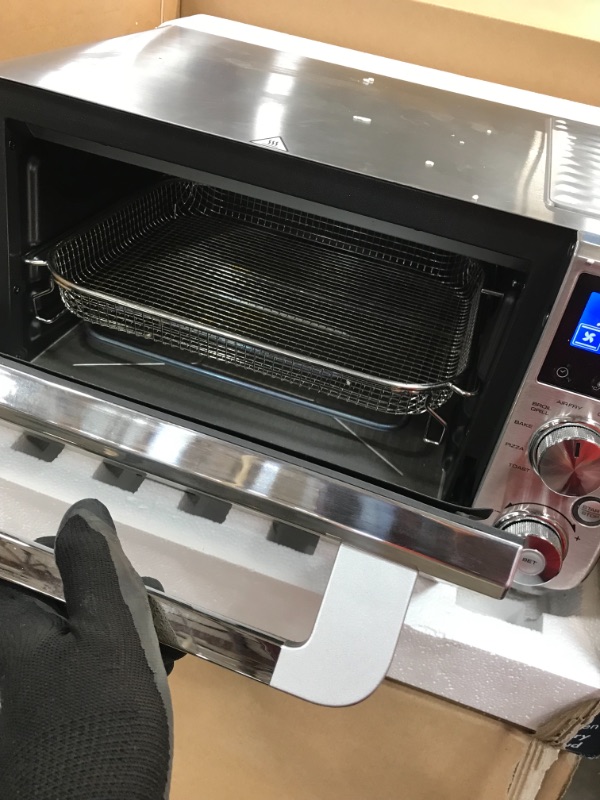 Photo 3 of *USED*
*MISSING pizza tray*
De'Longhi Livenza 9-in-1 Digital Air Fry Convection Toaster Oven, Grills, Broils, Bakes, Roasts, Keep Warm, Reheats, 1800-Watts + Cooking Accessories, Stainless Steel, 14L (.5 cu ft), EO141164M
