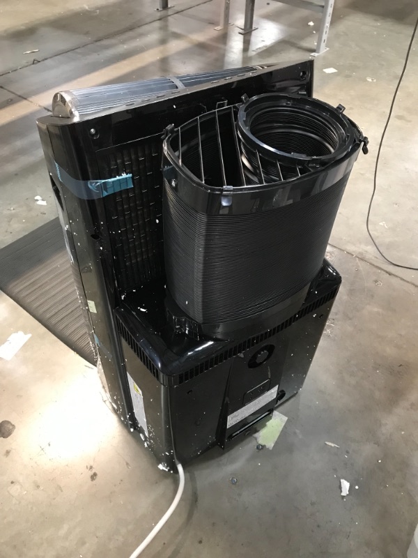 Photo 3 of *front fan is not straight, SEE last picture*
Midea Duo 12,000 BTU(10,000 BTU SACC)Ultra Quiet Smart HE Inverter Portable Air Conditioner, Dehumidifier, and Fan-Cools upto 450 sq.ft, Works with Alexa/Google Assistant Includes Remote Control, Black

