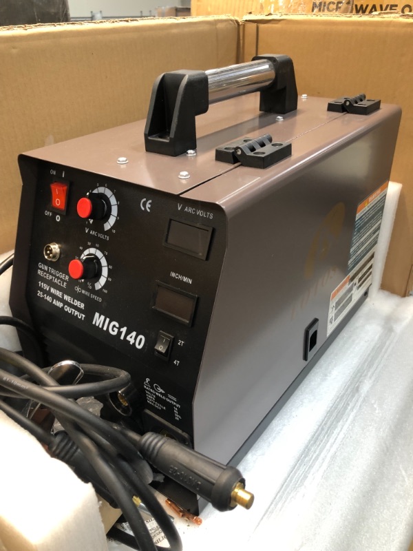 Photo 2 of LOTOS MIG140 140 Amp MIG Wire Welder, Flux Core & Aluminum Gas Shielded Welding with 2T/4T Switch Argon Regulator, Metal Wire Feeder, Brown/Black
