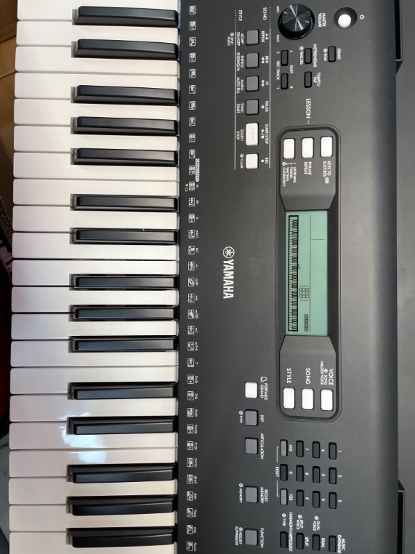 Photo 1 of YAMAHA PSREW310 76 KEY PORTABLE KEYBOARD