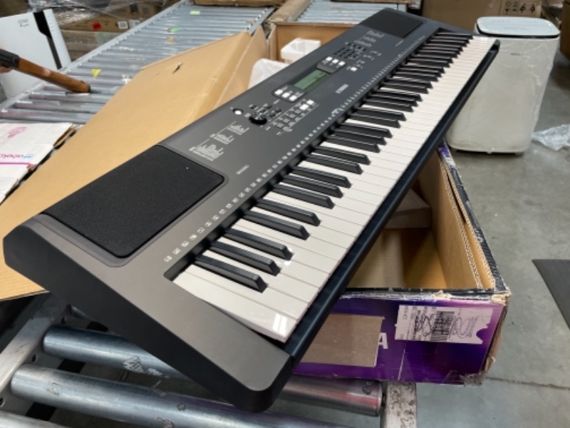 Photo 1 of YAMAHA PSREW310 76 KEY PORTABLE KEYBOARD
