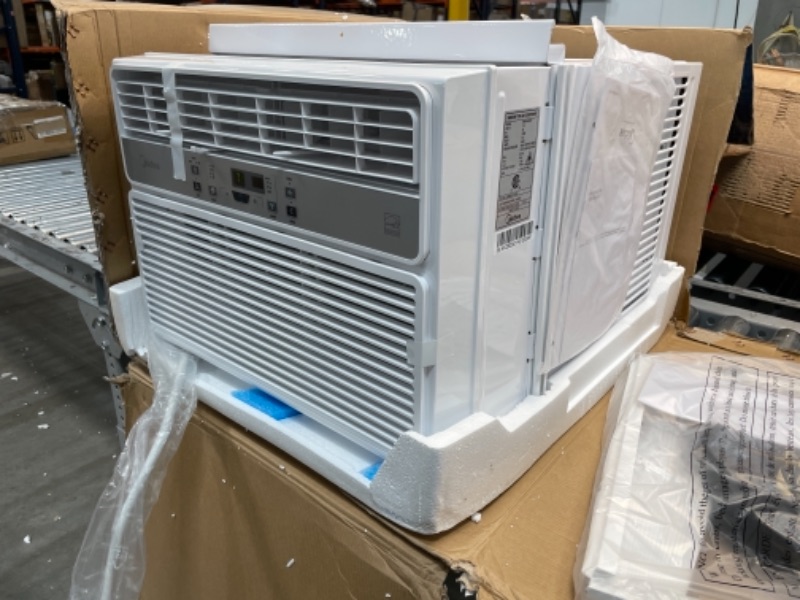 Photo 2 of MIDEA 10,000 BTU EasyCool Window Air Conditioner, Fan-Cools, Circulates, and Dehumidifies Up to 450 Square Feet, Has A Reusable Filter, and Includes an LCD Remote Control, 10000, White
