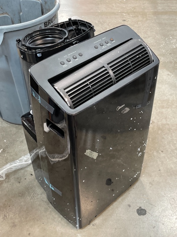 Photo 2 of NON-FUNCTIONAL: Midea Duo Ultra Quiet Smart HE Inverter Portable Air Conditioner, Dehumidifier, and Fan, Works With Alexa, Includes Remote Control, 14,000 BTU (12,000 BTU SACC) with Heater, Cools up to 550 sq.ft.
