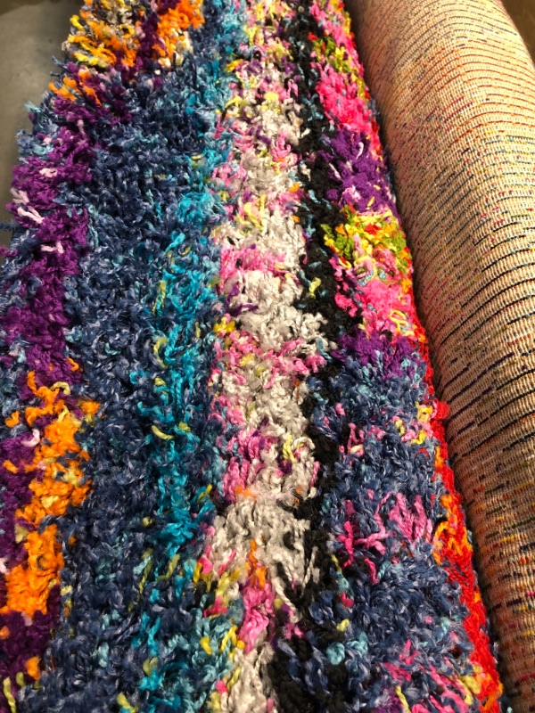 Photo 2 of ***STOCK PHOTO FOR REFERNCE ONLY***
5' X 8' MULTICOLOR SHAG RUG 