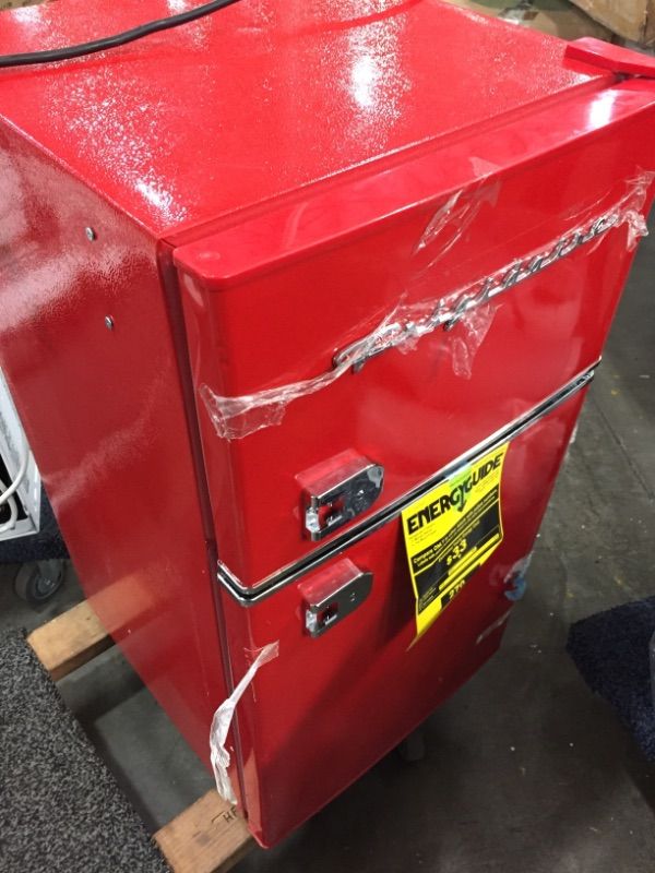 Photo 2 of Non-functional//Parts Only: Frigidaire EFR840RED 32 Cu Ft Red 2 Door Retro Bar Fridge with Side Bottle Opener corners are damaged due to shipping 