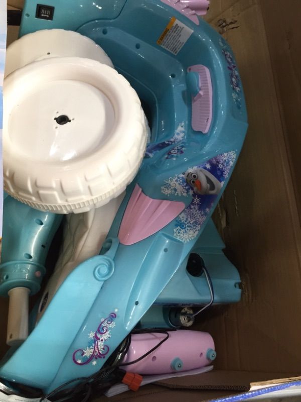 Photo 2 of Kid Trax Disney Frozen Kids Scooter Ride On Toy, 6 Volt, Kids 3-5 Years Old, Max Weight 55 lbs, Single Rider, Battery and Charger Included, Blue
