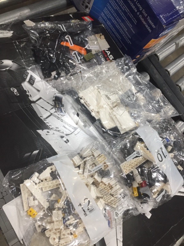 Photo 2 of ***Only bags 1, 10, 12 and top of shuttle*** LEGO NASA Space Shuttle Discovery 10283 Build and Display Model for Adults, New 2021 (2,354 Pieces)
**parts only ** 